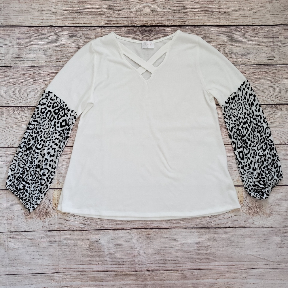 Boutique Black + White Cheetah Long Sleeve Top